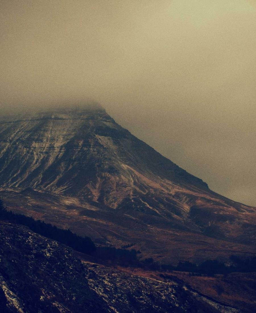 A volcano under heavy cloud