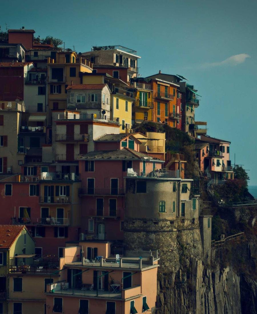 A hillside town of stacked houses