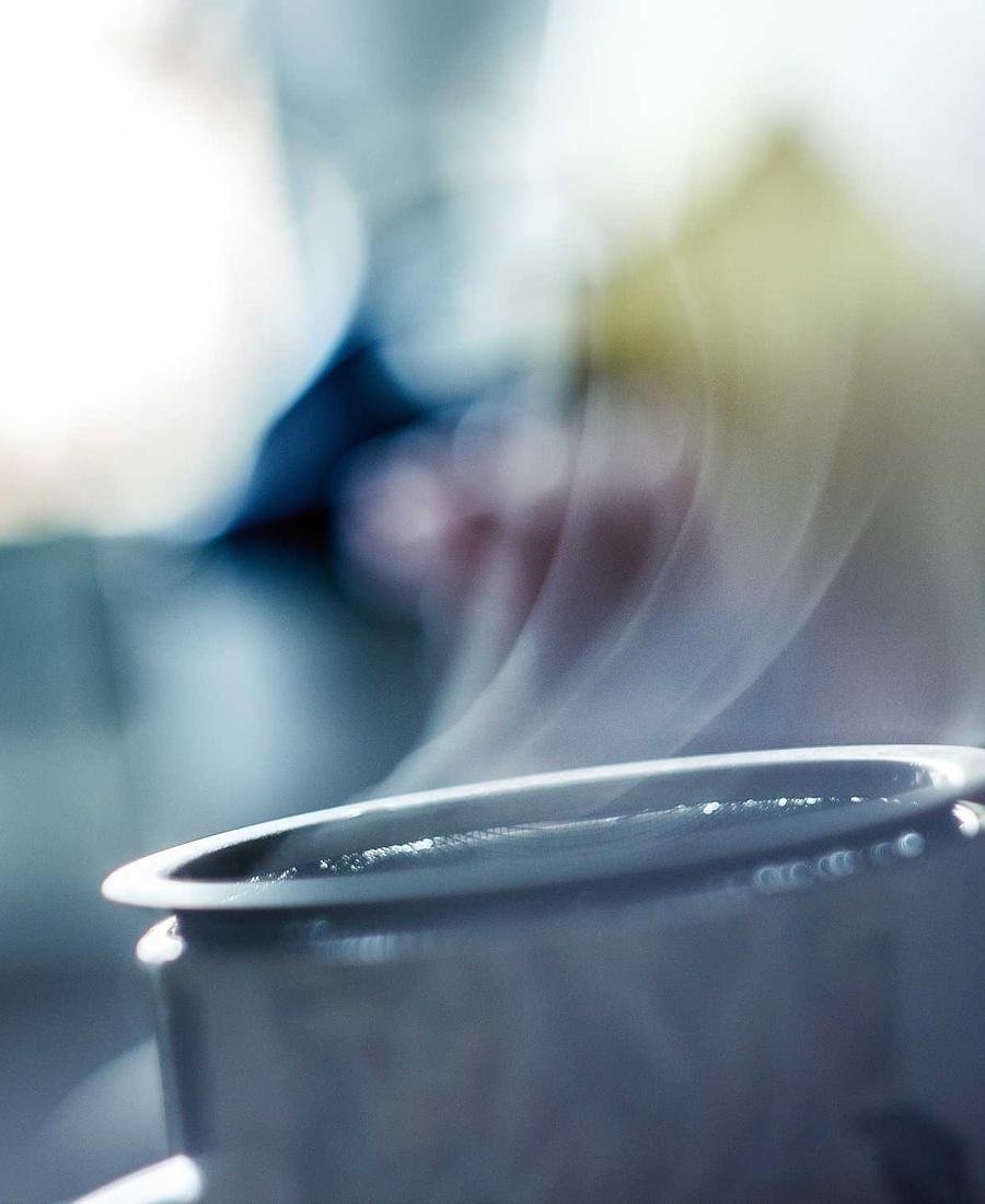 A curve of light on a pale surface