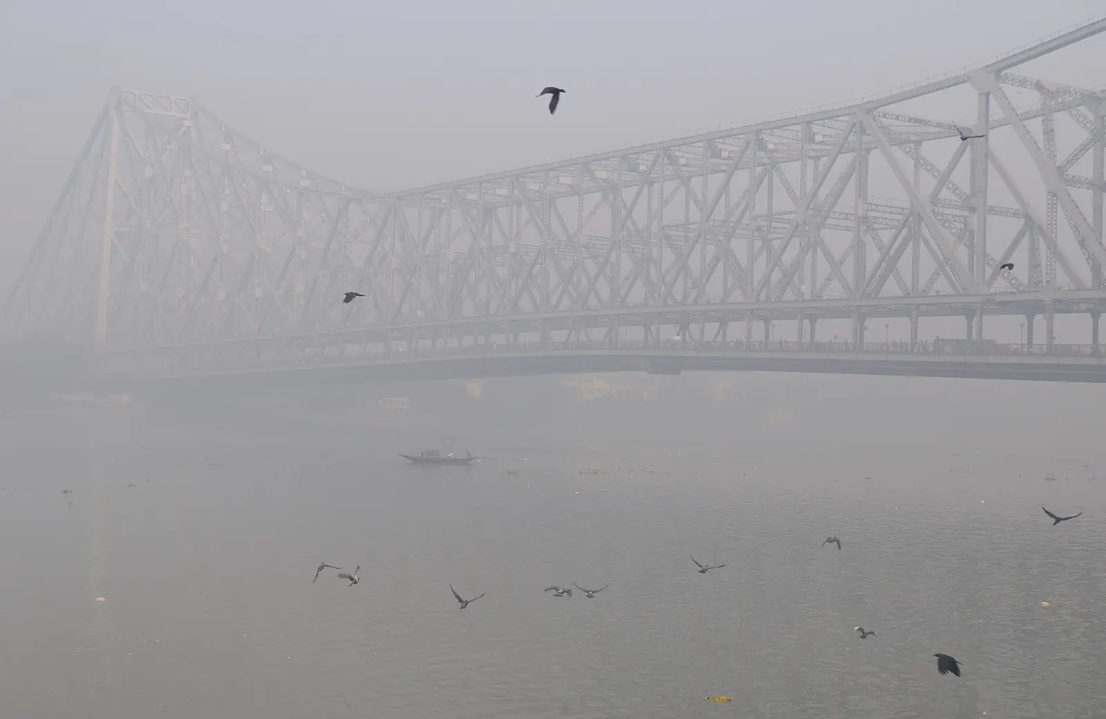 Howrah Bridge in Kolkata in the morning fog