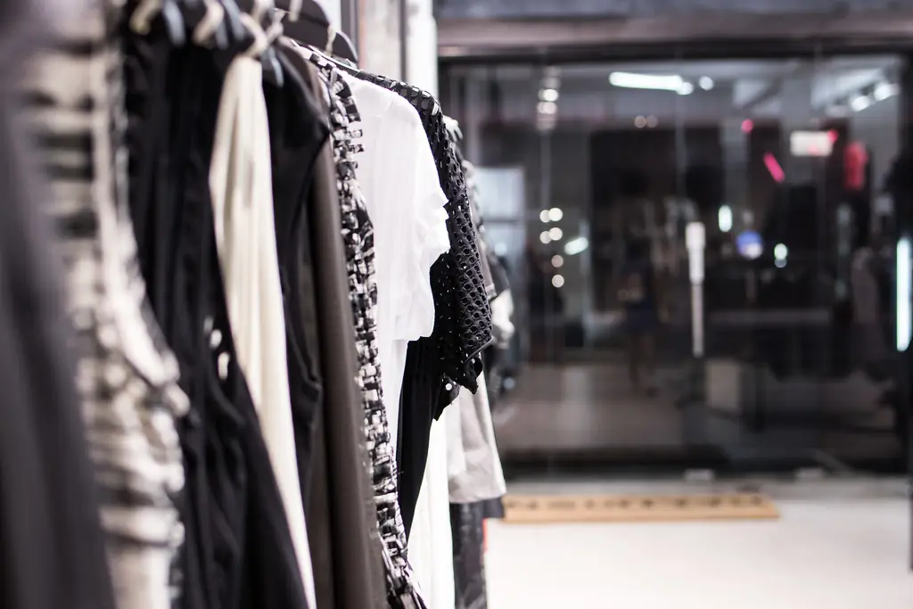 Clothes on rails in a shop